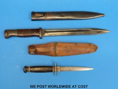 A German Durkopp bayonet in sheath and a William Rodgers fighting knife