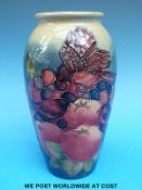A Moorcroft vase decorated in the Finches pattern (20cm tall)