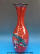 A Chinese cloisonné vase decorated with a blue dragon on red ground (35cm tall)