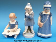 Three Copenhagen child figures (tallest 18cm)