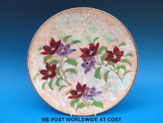A Royal Doulton charger in Magnella pattern (34cm diameter)