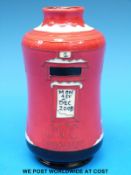 A Moorcroft vase designed as a pillar box dated 2008 (14cm tall)