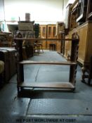 A walnut three tier bookcase with pierced ends (W72 x D18 x H74cm)