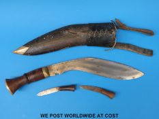 A kukri with two smaller examples attached