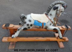Wooden dappled rocking horse