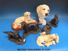 Seven resin dogs and dog groups,
