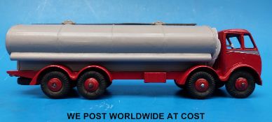 Dinky Supertoys diecast model Foden 14-ton tanker with red cab and chassis, grey tank, rigid hubs,