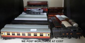 Over 25 Hornby Dublo 00 gauge carriages and wagons together with an LMS 0-6-2 tank locomotive 6917