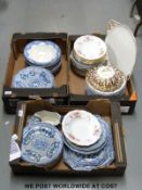 A large collection of blue and white plates, soup bowls,
