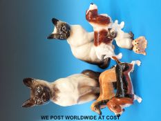 Two Beswick large Siamese cat figures, a small Siamese cat,