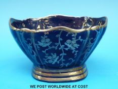 A Richard Ginori blue pedestal bowl with silver lustre decoration (7.