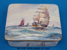 A Royal Crown Derby porcelain lidded box hand decorated with sailing ships under sail, signed W.E.