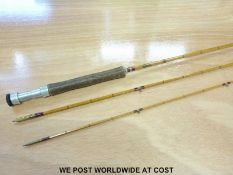 An Allcocks Commodore split cane three piece fishing rod in cloth bag