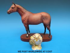 A Beswick Thoroughbred horse on base and Royal Albert Beatrix Potter figure 'Mr Alderman Ptolemy'