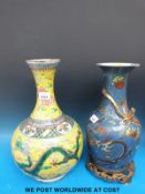 A large Chinese vase with dragon decoration on yellow ground together with another Chinese vase