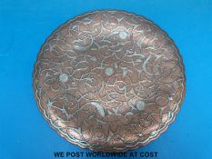 A copper inlaid silver Islamic / Persian footed dish