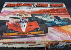 A Scalextric 500 boxed slot car racing set, with two motorbikes,