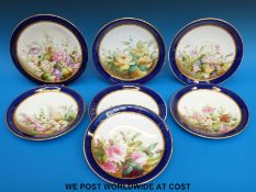 A collection of Royal Worcester dessert plates hand decorated with botanical theme (diameter 23.