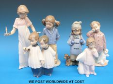 A quantity of Nao child figures