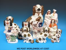 A group of Staffordshire dogs,