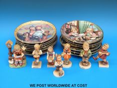 A collection of Goebel Hummel figures and plates