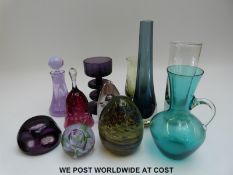 Eleven glass vases and paperweights by Caithness, Wedgwood,