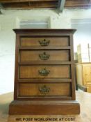 A miniature inlaid walnut apprentice chest of four straight graduated drawers (W29.