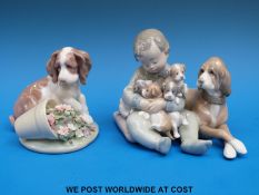Two Lladro figures featuring puppies including a Collectors Club example (12cm tall)