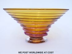 Stewart Hearn studio glass bowl of tapering form with pink applied decoration on amber ground,