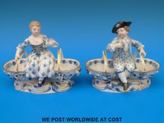 A pair of Meissen figural sweetmeat dishes (13cm tall)