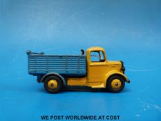 Dinky Toys diecast model Bedford End Tipper lorry with yellow cab and chassis and blue bed 410.