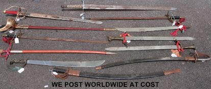 Twelve decorative swords and other bladed weapons including Toledo example
