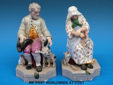 A pair of 19thC Russian porcelain figures, probably Gardner Manufactory,