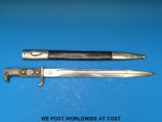 A WWII Nazi German Police dress bayonet by Alexander Coppel Solingen with scabbard marked SB 7999