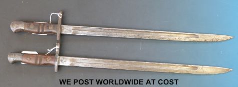 A pair of 1913 Remington bayonets