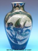 A large Lauder Barum vase decorated with stylised fish (30cm tall)