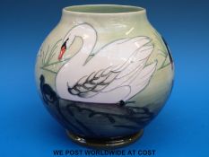 A Moorcroft limited edition vase (313/350) decorated with swans, c2000 (17.