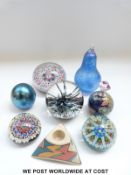 An English magnum paperweight with star shaped red,