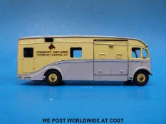 Dinky Toys diecast model Newmarket Racehorse transporter with grey lower body and roof,