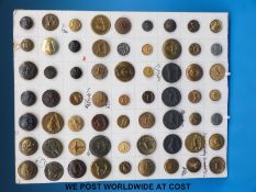 A card of sixty three largely 19thC sporting buttons with various insignia including deer, hounds,