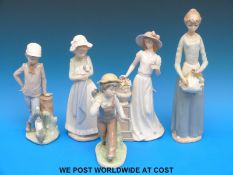 Three Nao Child figures and Nadal figures