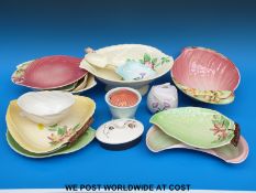 A collection of decorative Carlton ware including a salad bowl and servers,