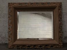 A gilt framed bevelled edge mirror (overall size 88 x 76cm)
