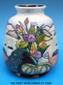 A Moorcroft pedestal vase decorated with a seascape in the Islay pattern (14.