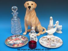 A Beswick fireside golden retriever together with two Nao geese, Royal Worcester collector's plates,