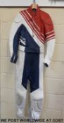 A Hein Gericke leather armoured motorcycle suit in red, white and blue styling (ladies size small,