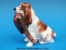 A Royal Doulton Spaniel with Pheasant HN1029 (9cm tall)