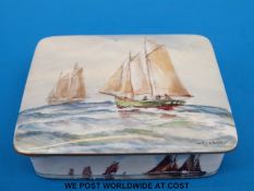 A Royal Crown Derby porcelain lidded box hand decorated with sailing ships under sail and signed W.