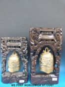 Two wire inlaid carved bell stands with brass bells