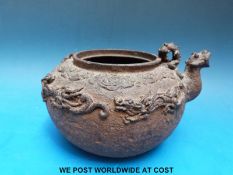 A Japanese bronzed teapot decorated with dragons with seal mark to base